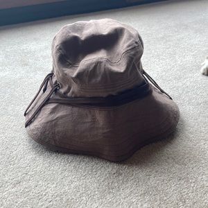 Cute Bucket hat for summer on a muted brown